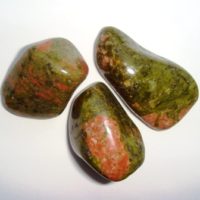 Helps you to remain strong in your beliefs even when no one supports you.  Assists in detachment from the old and encourages you to attain your goals.  Gives you the ability to complete take charge of your own life.  The pink/peach is Feldspar, which is in the Moonstone family; green is Epidote and Quartz.